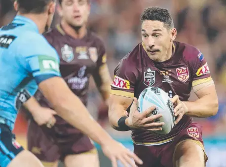  ??  ?? LEADING WAY: Queensland fullback Billy Slater takes a hit- up during his farewell State of Origin game last night.