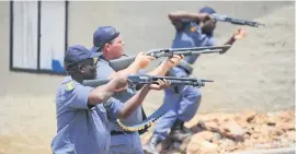  ??  ?? OPEN FIRE. Police fire on residents in Krugersdor­p.