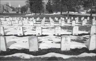  ?? PHOTO COURTESY OF US OFFICE OF ARMY CEMETERIES; Below: ?? Above: Carlisle Indian Cemetery continues to hold the remains of 180 children who died while at the Carlisle Indian Industrial School. Lindsay Montgomery (first from left) with Hopi Tribe elder Elidia S. Chapella and her family in 2016.