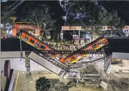  ?? Hector Vivas Getty Images ?? THE COLLAPSE of an elevated Metro line in Mexico City killed 26 people in May 2021. The dilapidate­d subway system has become a symbol of Mexico’s problems.