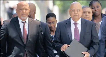  ?? PHOTO: REUTERS ?? In this file photo Finance Minister Pravin Gordhan, right, and Deputy Finance Minister Mcebisi Jonas arrive for the 2017 Budget speech at Parliament. The writer argues that as Gordhan and Jonas urge growth for South Africa, nuclear build will provide...