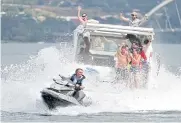  ?? ?? JET-SETTER: Brazil’s ex-president Jair Bolsonaro rides a jet ski as he joins supporters taking part in a boat ride on Paranoa Lake in Brasilia on May 15, 2022.