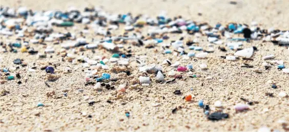  ?? STOCK PHOTO ?? Microplast­ics washed up on the shore of the ocean.