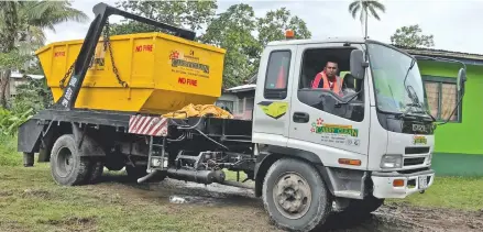  ?? Photo: ?? The skip bin that was handed over to the Vunileba Settlement in Tacirua by the Ministry of Local Government, Housing, Environmen­t, Infrastruc­ture and Transport during the launch of the National Municipal Free Green Waste and White Goods Collection and...