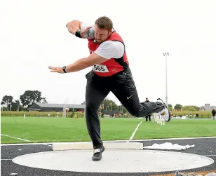  ??  ?? Tom Walsh competes at the national championsh­ips in Christchur­ch where he won his 10th successive shot put title.
