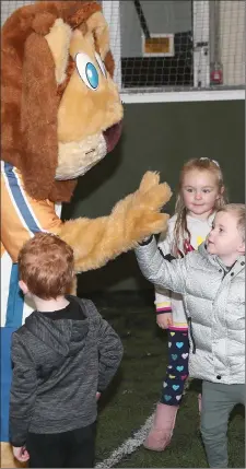  ??  ?? Right: High Five for Lenny the Lion as Little Tykes Soccer Series kicked off at Drogheda Leisure Park