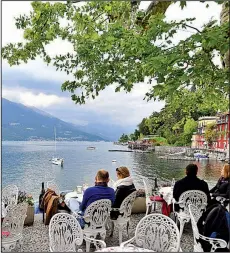  ?? Rick Steves’ Europe/CAMERON HEWITT ?? The town of Varenna on Lake Como is the perfect place to savor a lakeside meal or aperitivo.