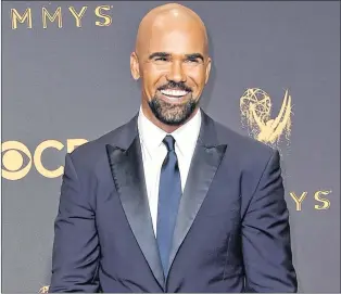  ?? AP PHOTO/RICHARD SHOTWELL ?? In this Sept. 17, 2017 file photo, Shemar Moore arrives at the 69th Primetime Emmy Awards in Los Angeles. Moore stars in the new crime drama‚ “S.W.A.T.,” premiering Thursday on CBS.