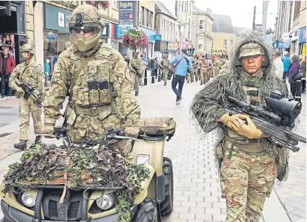  ?? Sandy McCook. Pictures: ?? Members of 3 SCOTS (The Black Watch) during their homecoming parade through Inverness.
