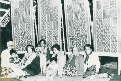  ?? Photo / Whanganui Regional Museum Collection Ref: MM-82 ?? A photograph of the newly completed tukutuku panels at the entrance of Te Atihaunui-a-Paparangui The Maori Court at Whanganui Regional Museum, 1970. The panels feature the many varieties of woven patterns. From left are Mrs Phillipa Pikimaui — Hemi Pikimaui, Mrs Ruaka Rewiti, Mrs Ema Hipango, Mrs Moe Tiraha, Mrs Arahori Potaka, Matui Potaka, Mrs Pare Paamu, Mrs Rangitaamo Takarangi.