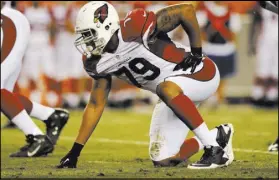  ?? JACK DEMPSEY/THE ASSOCIATED PRESS FILE ?? David Carter, shown while a defensive lineman for the Cardinals in 2013, became an advocate for a vegan diet, even for top-level athletes, starting in 2014.