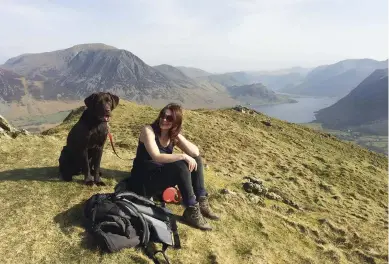  ??  ?? LEFT Sue Hayman with Max on Low Fell, overlookin­g Crummock Water in the Lake District