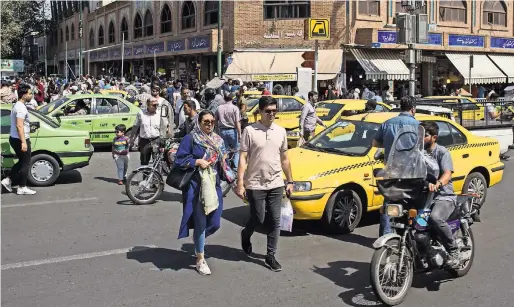  ?? ARASH KHAMOOSHI FOR THE NEW YORK TIMES ?? European nations are trying to work around American sanctions against Iran, in order to save a nuclear deal. Tehran’s Grand Bazaar.