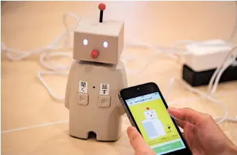  ??  ?? Communicat­ion robot Bocco is a family bulletin board that allows you to exchange messages with your family and check sensor responses.