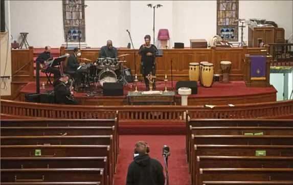  ?? Emily Matthews/Post-Gazette photos ?? Anqwenique Wingfield performs during the livestream of the 15th annual Let Freedom Sing concert to celebrate the legacy of Dr. Martin Luther King Jr. Saturday at Wesley Center AME Zion Church in the Hill District.