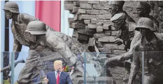  ?? Ap photo ?? RECALLING HISTORY: President Trump speaks in Warsaw, Poland, backdroppe­d by a monument commemorat­ing the 1944 Warsaw Uprising against the Nazis.