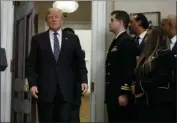  ?? PHOTO/EVAN VUCCI ?? President Donald Trump arrives to an event to honor Dr. Martin Luther King Jr., in the Roosevelt Room of the White House on Friday in Washington. AP