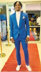  ?? ALLEN/PHOTOGRAPH­ER IAN ?? World Under-20 400 metres hurdles record holder Roshawn Clarke on the red carpet ahead of last Friday’s RJRGLEANER National Sportsman and Sportswoma­n of the Year ceremony at The Jamaica Pegasus hotel in New Kingston.