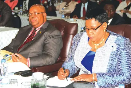  ??  ?? House of Assembly Speaker Advocate Jacob Mudenda (left) and Senate President Mabel Chinomona follow proceeding­s at a post-budget seminar in Harare yesterday. (Picture by Shelton Muchena) —