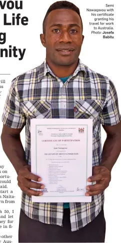  ?? Josefa Babitu ?? Semi Nawaqavou with his certificat­e granting his travel for work to Australia. Photo: