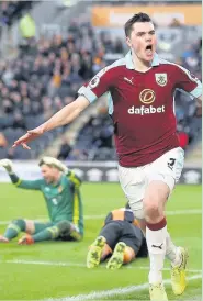  ?? Mark Robinson ?? Michael Keane celebrates his goal against Hull at the KCOM Stadium