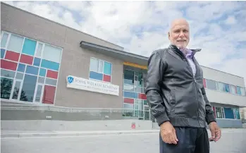  ?? RIC ERNST/PNG ?? John Volken stands outside the centre named after him in Surrey, offering treatment to addicts aged 19-32.
