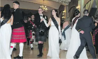  ?? INTERNATIO­NAL PHOTO IMAGING ?? Rebecca Elliot Maccaul is escorted by Brett Owen Gilmore at the 2016 St. Andrew’s Society Ball. Marilyn Meikle Rochford of the St. Andrew’s Society says balls are no longer about putting girls “on the market,” but about promoting cultural traditions and connecting with history.