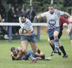  ??  ?? Tom Aviss on the charge for the Lions.