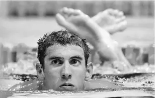  ?? - AFP photo ?? (FILES) In this June 29, 2012 file photo, US swimmer Michael Phelps makes his way out of the pool following his first place finish in Heat 12 of the men’s 200M Individual Medley at the 2012 US Olympic Team Trials in Omaha, Nebraska.