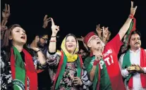  ?? PHOTO: REUTERS ?? Jubilation . . . Supporters of Imran Khan celebrate a day after the general election in Karachi, Pakistan.