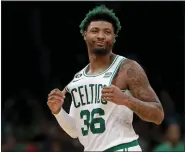 ?? MATT STONE — BOSTON HERALD ?? Marcus Smart of the Boston Celtics goofs off during the second half of the NBA game against the Detroit Pistons at the TD Garden on February 15, 2023.