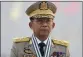  ?? THE ASSOCIATED PRESS ?? Myanmar’s Commanderi­n-Chief Senior Gen. Min Aung Hlaing presides over an army parade on Armed Forces Day in Naypyitaw, Myanmar, on March 27, 2021.