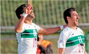  ?? — Supplied photo ?? Morteza Tabrizi (right) celebrates with a teammate after scoring against Al Wahda.