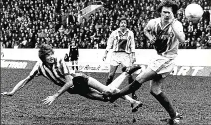  ??  ?? Derby and groan: Ian Mellor misses but the Owls romp home in the ‘Boxing Day massacre’