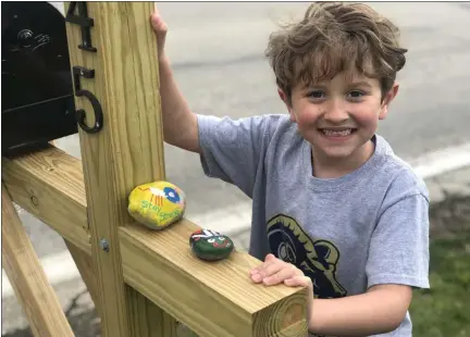  ?? PHOTO COURTESY OF SHERRI RUSSO ?? One of the rocks Jack Russo painted has a positive message during this difficult time — “Stay strong.”