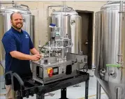  ?? COURTESY ?? Lead instructor Steve Anderson shows off the new equipment for Chattahooc­hee Tech’s Brewing and Fermentati­on Production Technology program.