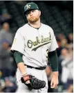  ?? Abbie Parr / Getty Images ?? Brett Anderson is none too pleased after giving up a homer to Nelson Cruz.