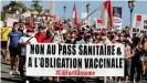  ??  ?? Protesters put their views against the vaccine passport and forced vaccinatio­ns in Monaco