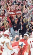  ?? STEPHEN LEW/USA TODAY SPORTS ?? Alabama fans react after a touchdown against Clemson during the Sugar Bowl on Monday in New Orleans.