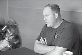  ?? Staff photo by Evan Lewis ?? n Lee Walker, a 1993 graduate of Prescott High School, talks about the storied history of Curley Wolves football during an interview Wednesday at Ko-Fields Diner in Prescott, Ark.