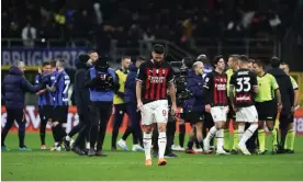  ?? Marco Luzzani/Getty Images ?? Olivier Giroud trudges off the field after Milan’s 1-0 defeat to Inter on Sunday. Photograph: