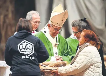  ?? Vincenzo Pinto, AFP ?? Pope Francis leads a Mass to mark the first World Day of the Poor, on Sunday at the Vatican.
