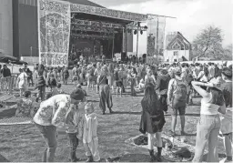  ?? MEGAN MENDOZA/THE REPUBLIC ?? The crowd watches Thom.ko perform at M3F Fest in Margaret T. Hance Park on March 4, 2022, in Phoenix.