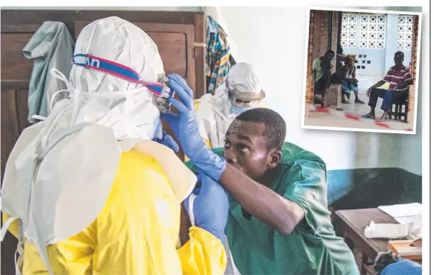  ?? Picture: UNICEF ?? ALERT: Health workers don protective clothing to attend to suspected ebola patients in Bikoro, Congo, where an outbreak was announced last week and (inset, above) suspected ebola sufferers wait outside a clinic in the rural region.