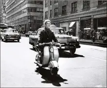  ?? NEAL BOENZI / NEW YORK TIMES ?? Broadway actress Susan Johnson opts for a motorized two-wheeled commute in New York in 1958. Commuting has always been soulcrushi­ng, but people have reinvented the task over the years in inspiring ways: by walking, bicycling, scooting and so on.