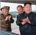  ??  ?? PeaCe MOVe: Kim Jong-un at the launch of a test missile