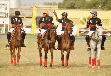  ??  ?? Proprietor of Keffi Polo Ranch and Patron Keffi Ponys team, Honourble Aliyu Wadada (left) leading out his team at a recent polo tournament.