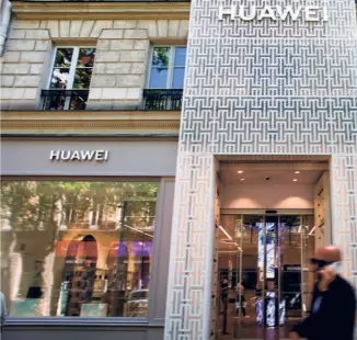  ??  ?? HUAWEI’S FLAGSHIP STORE in Paris, on July 7. Huawei is the world’s largest telecommun­ications equipment provider, way ahead of companies such as Nokia, Ericsson and its Chinese rival ZTE.