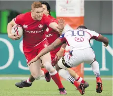  ?? THE CANADIAN PRESS/FILES ?? Canada’s Connor Braid, left, in action during the World Rugby Seven Series in Vancouver in March.