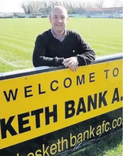  ??  ?? ● Darren McDonald has received a Love Hesketh Bank award - he is pictured wearing his ‘Love Hesketh Bank’ pin badge award